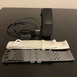 Fitbit charge 4 w/2 free large sports bands